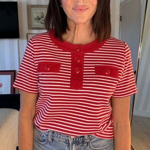 Red and white striped shirt with gold buttons